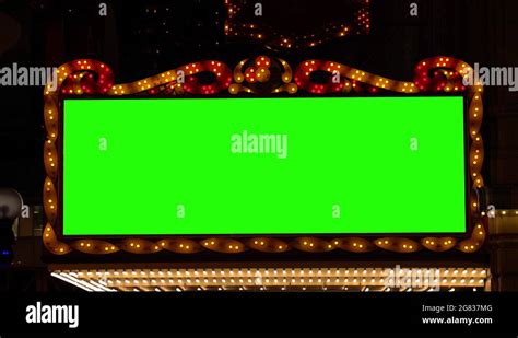 Golden Bulbs Marquee Lights Banner Background With Green Screen Stock