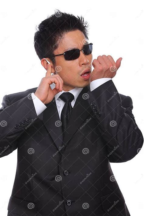 asian bodyguard talking in microphone listening stock image image of chinese listening 27543483