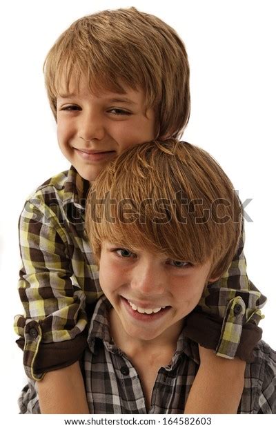 Two Young Brothers Aged 9 Hugging Stock Photo 164582603 Shutterstock