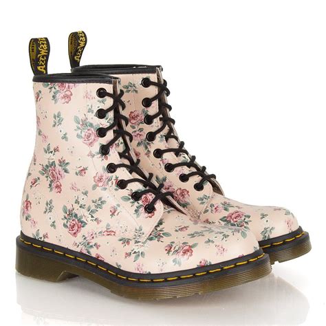 Doc martens are sturdy, versatile boots and shoes that can be worn for many different occasions. White Doc Martens pink roses floral print