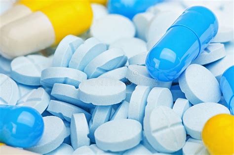 Drug Blue Pill In A Pile Of Medical Pills Stock Photo Image Of Drugs