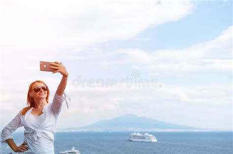 Pretty Girl Takes A Selfie Photo Sea And Horizon In The Background Vacation And Travel Concept