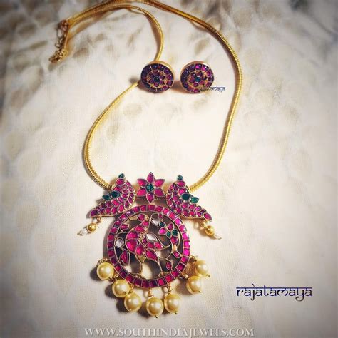 gold plated ruby necklace set from rajatamaya south india jewels