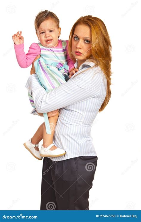 an exhausted mother is lying on her daughter after heavy yoga classes and smiling cute and