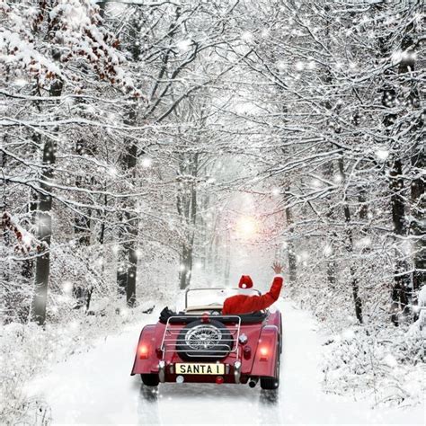 Father Christmas In Car Snow Scene 10492504 Framed Photos