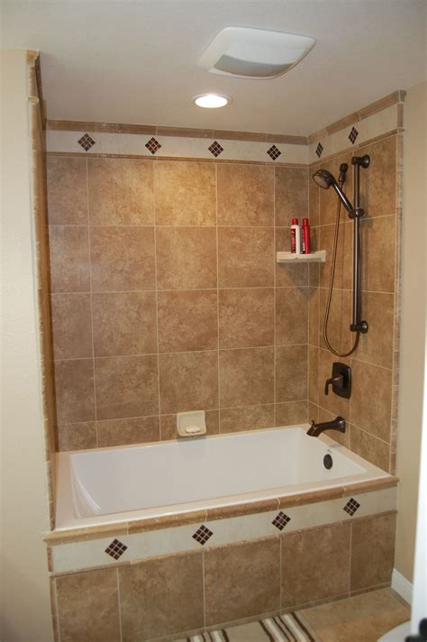 Have a professional install a shower membrane and shower pan appropriate for the space. Tile work around shower/ bathtub combo | Bathroom kids ...