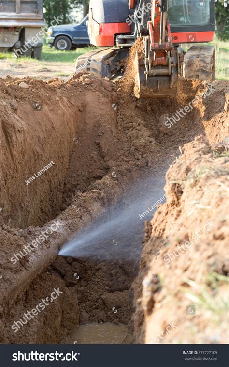 It makes eyes water and causes intense pain, sometimes even leading to temporary blindness. Exposing A Burst Water Main, Focused On The Spraying Water ...