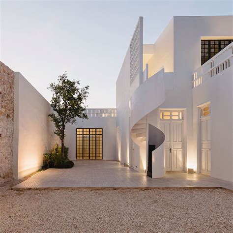 Modern Villa with Exterior Spiral Staircase in Rustic Courtyard | iDesignArch | Interior Design ...