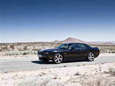 The 2012 dodge challenger srt8 comes equipped with standard features such as leather seats with perforated suede inserts, a heated. Automotive Area: 2012 Dodge Challenger SRT8 392