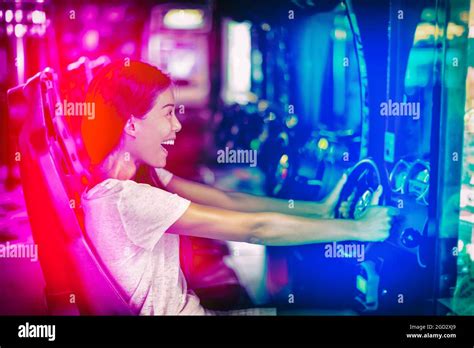Japanese Gaming Cyber Cafe Girl Gamer Having Fun Gaming Driving Racing Car Game Fun Asian Woman