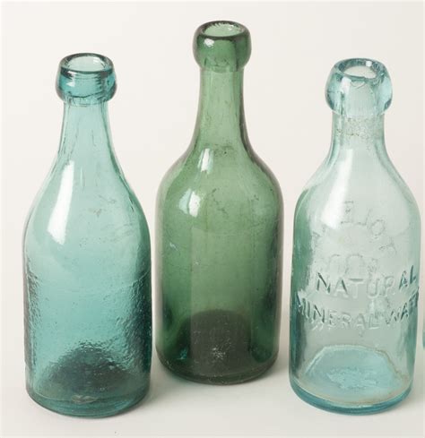 Four Antique Soda Bottles | Witherell's Auction House
