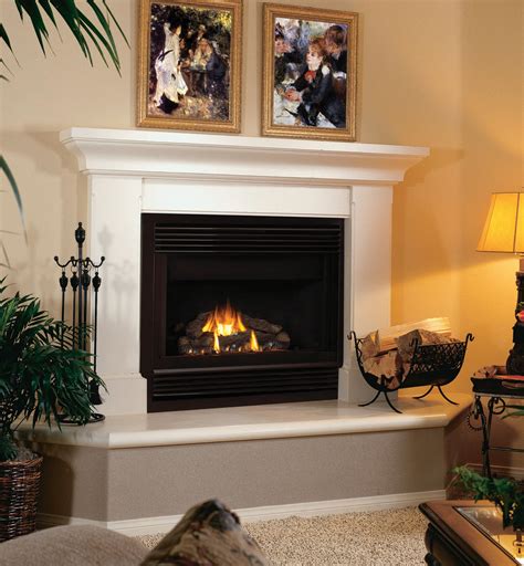 Fireplace Design With White Kits And Frames Above 
