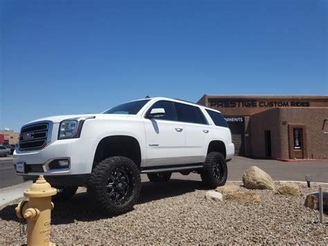 2015 Gmc Yukon 4wd With A 75 Rough Country Suspension Lift Kit And A