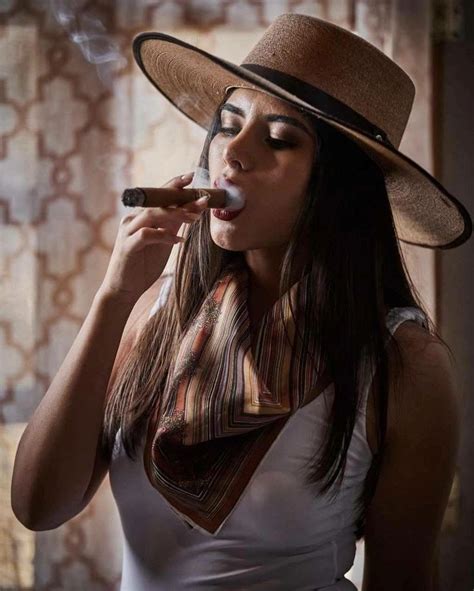 let s face it how sexy is it when a woman smokes a cigar