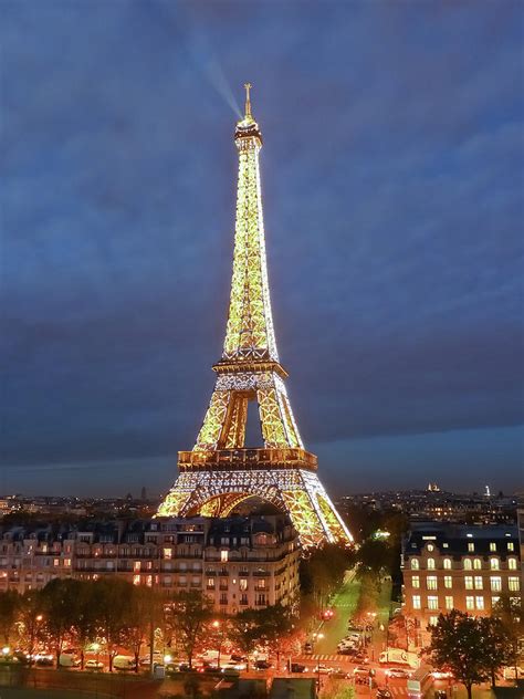 Eiffel Tower At Dusk With Hourly Light By Sir Francis Canker Photography
