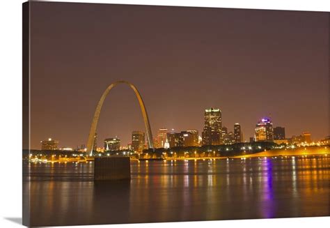 The Gateway Arch And St Louis Skyline Reflect Into The Mississippi