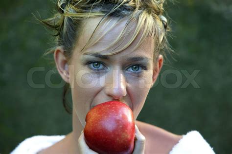 Woman Eating An Apple Stock Image Colourbox