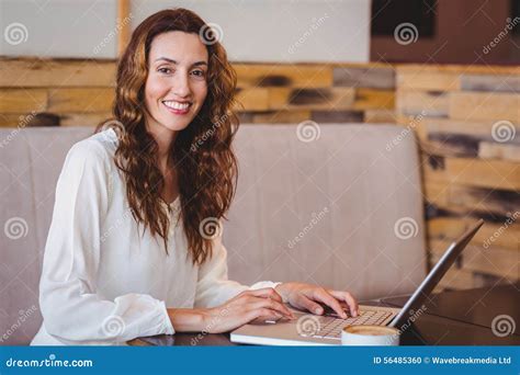Pretty Brunette Having Coffee Using Laptop Stock Photo Image Of Cappuccino Person