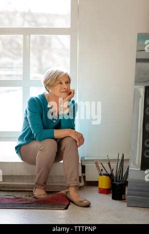 Nude Woman Sitting On Window Sill Portrait Stock Photo Alamy