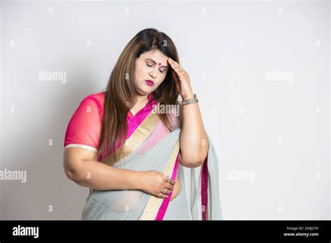 Portrait Of Overweight Indian Woman Wearing Saree Isolated On White