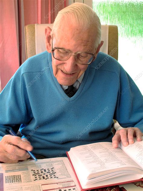 Elderly Man Doing Crossword Stock Image C0130733 Science Photo