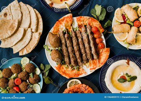 Traditional Arab Cuisine Including Kebab Meat Kibbeh Mutabal Falafel