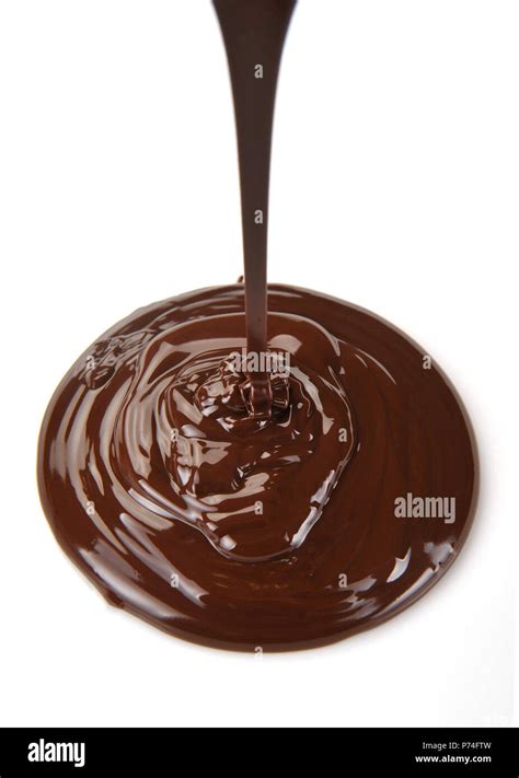 Chocolate Flow Isolated On White Background Stock Photo Alamy