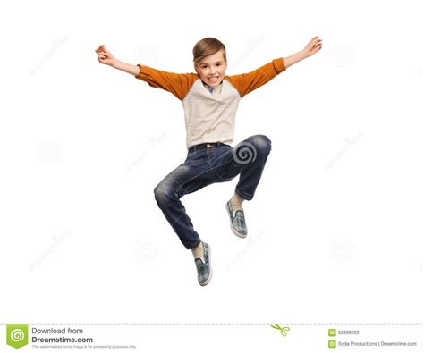 Muchacho Sonriente Feliz Que Salta En Aire Imagen De Archivo Imagen De Alegre Deporte