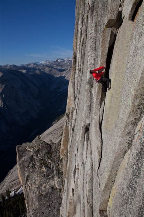 A Climber Walks A 40 Foot Long Sliver Of Granite On Half Dome Named