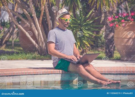 Man Working On Laptop At The Poolside Stock Image Image Of Pool