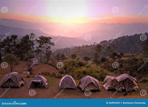 Camping Tents On The Top Of Mountain During Beautiful Sunset Stock
