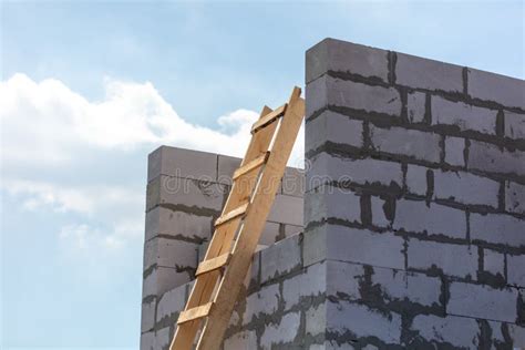 Construction Of The Walls Of The House From Foam Concrete Bricks Stock