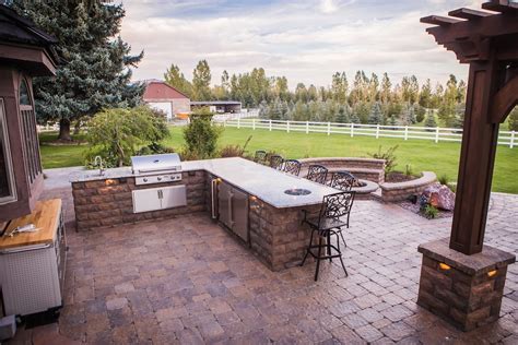 Cost to build a patio installation. Brick Pavers vs Stamped Concrete: Cost Considerations