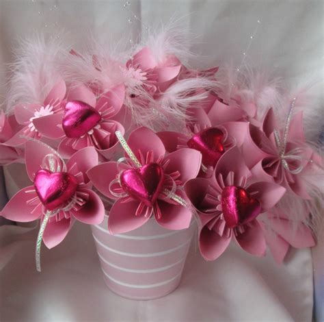 Pink Origami Flowers With A Heart Shaped Chocolate Centre