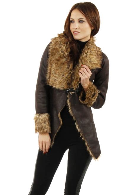 Select women's designer clothing pieces include extra embellishments like lace sleeves, foil printing, and metal studs to elevate casual style to modern. Faux Fur Jacket | Faux Shearling Jacket | Aviator Jacket