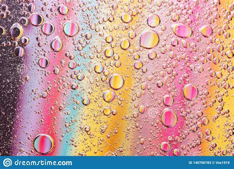 Beautiful Macro Photo Of Water Droplets In Oil With A