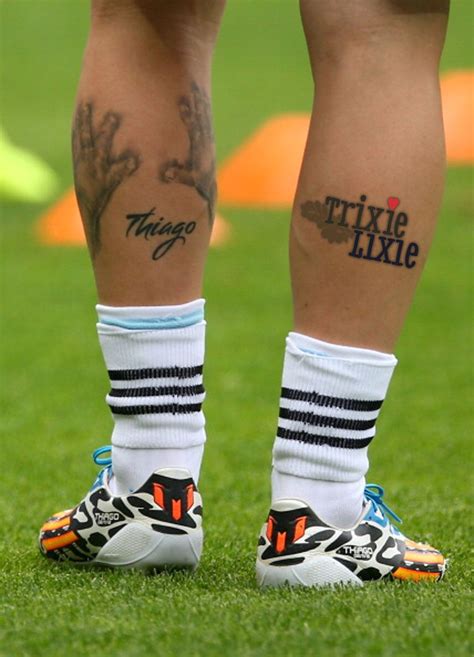 'mother's portrait' tattoo on the left side of his back. Argentina's footballing superstar, Lionel Messi, shows off ...