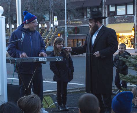 The Chabad Of Greenwich Menorah Lighting The First Candle Is Lit