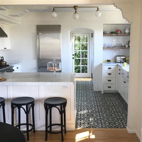 White Kitchen With Patterned Tile Floor White Kitchen Design Kitchen