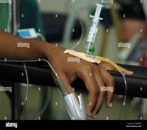 Intravenous Drip Hand High Resolution Stock Photography And Images Alamy