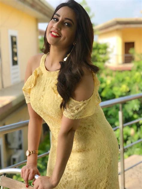 glamorous indian girl manjusha photos in sleeveless yellow dress glamorous indian models