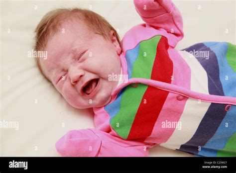 Newborn Baby Girl Crying Stock Photo Alamy