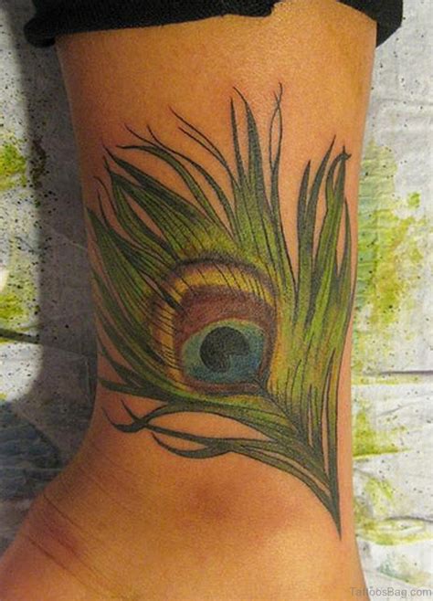 31 Awesome Peacock Feather Tattoos On Wrist Tattoo Designs