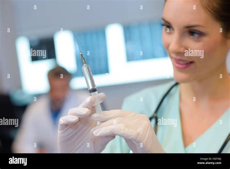 Nurse Preparing Injection Stock Photo Alamy