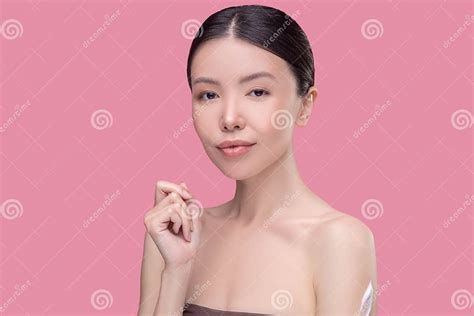 Pretty Asian Girl With Naked Shoulders Looking Thoughtful Stock Image Image Of Beautiful