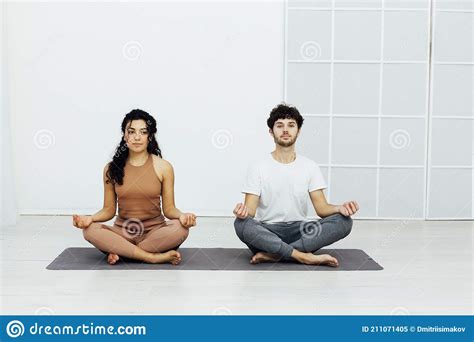 Male And Female Doubles Yoga Asana Gymnastics Fitness Stock Image