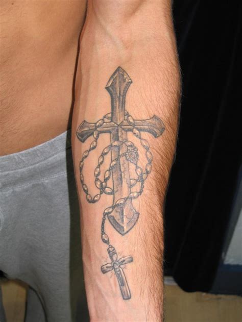 Religious Gray Ink Cross With Beads Tattoo On Forearm Tattooimagesbiz