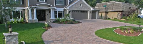 Hardscape patio construction costs stretch beyond just the pavers and labor. Paver Driveways | Cost & Installation v. Asphalt/Concrete ...