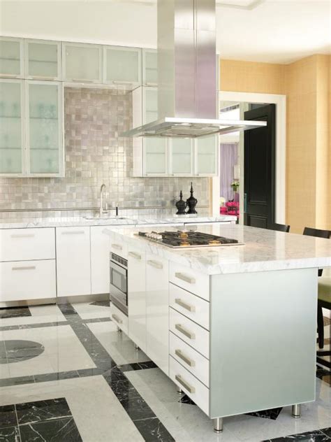 The tile has enough inherent style to create interest but the color. Modern Kitchen With Frosted Glass Cabinets | HGTV