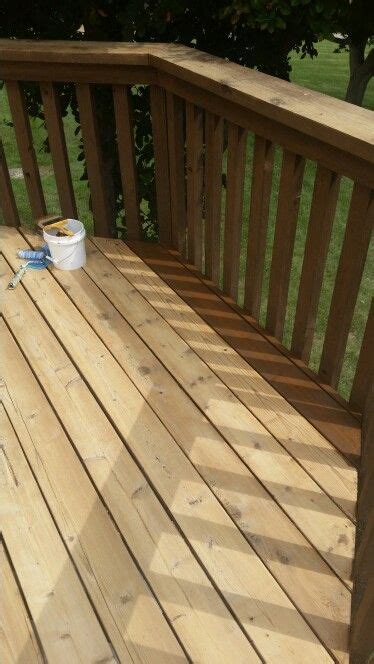 Find quick results from multiple sources. Re-Staining a Deck-DURING. Applying Sherwin Williams ...